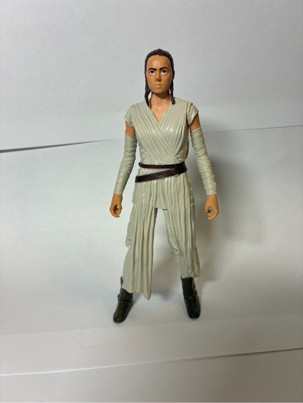 Action Figure in Cream Tunic with Brown Belt
